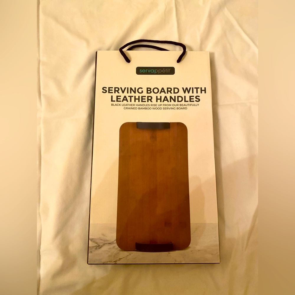 Serving board with leather handles